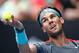 MELBOURNE, AUSTRALIA - JANUARY 20: Rafael Nadal of Spain serves in his fourth round match against Kei Nishikori of Japan during day eight of the 2014 Australian Open at Melbourne Park on January 20, 2014 in Melbourne, Australia. (Photo by Scott Barbour/