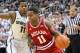 Jan 21, 2014; East Lansing, MI, USA; Indiana Hoosiers guard Yogi Ferrell (11) drives to the basket against Michigan State Spartans guard Keith Appling (11) during the 1st half of a game at Jack Breslin Student Events Center. Mandatory Credit: Mike Carter