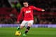 MANCHESTER, ENGLAND - DECEMBER 21: Wayne Rooney of Manchester United in action during the Barclays Premier League match between Manchester United and West Ham United at Old Trafford on December 21, 2013 in Manchester, England. (Photo by Stu Forster/Gett