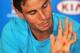 MELBOURNE, AUSTRALIA - JANUARY 20: Rafael Nadal of Spain shows his blistered hand during a press conference after he won his fourth round match against Kei Nishikori of Japan during day eight of the 2014 Australian Open at Melbourne Park on January 20, 2