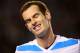 MELBOURNE, AUSTRALIA - JANUARY 22: Andy Murray of Great Britain looks on in his quarterfinal match against Roger Federer of Switzerland during day 10 of the 2014 Australian Open at Melbourne Park on January 22, 2014 in Melbourne, Australia. (Photo by Ma