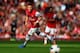 LONDON, ENGLAND - OCTOBER 19: Mesut Oezil of Arsenal in action during the Barclays Premier League match between Arsenal and Norwich City at the Emirates Stadium on October 19, 2013 in London, England. (Photo by Paul Gilham/Getty Images)