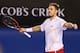 MELBOURNE, AUSTRALIA - JANUARY 21: Stanislas Wawrinka of Switzerland celebrates winning in his quarterfinal match against Novak Djokovic of Serbia during the 2014 Australian Open at Melbourne Park on January 21, 2014 in Melbourne, Australia. (Photo by