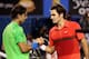 MELBOURNE, AUSTRALIA - JANUARY 26: Roger Federer of Switzerland and Rafael Nadal of Spain embrace at the net after their semifinal match during day eleven of the 2012 Australian Open at Melbourne Park on January 26, 2012 in Melbourne, Australia. (Photo