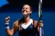 MELBOURNE, AUSTRALIA - JANUARY 22: Dominika Cibulkova of Slovakia celebrates winning her quarterfinal match against Simona Halep of Romania during day 10 of the 2014 Australian Open at Melbourne Park on January 22, 2014 in Melbourne, Australia. (Photo b
