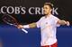 MELBOURNE, AUSTRALIA - JANUARY 21: Stanislas Wawrinka of Switzerland celebrates winning in his quarterfinal match against Novak Djokovic of Serbia during the 2014 Australian Open at Melbourne Park on January 21, 2014 in Melbourne, Australia. (Photo by