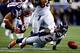 FOXBORO, MA - NOVEMBER 24: Running back Montee Ball #28 of the Denver Broncos fumbles the ball in the third quarter against the New England Patriots during a game at Gillette Stadium on November 24, 2013 in Foxboro, Massachusetts. (Photo by Jared Wicker