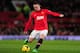 MANCHESTER, ENGLAND - DECEMBER 21: Wayne Rooney of Manchester United in action during the Barclays Premier League match between Manchester United and West Ham United at Old Trafford on December 21, 2013 in Manchester, England. (Photo by Stu Forster/Gett