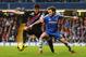 LONDON, ENGLAND - DECEMBER 14: (L-R) Joel Ward of Crystal Palace and Juan Mata of Chelsea challenge for the ball during the Barclays Premier League match between Chelsea and Crystal Palace at Stamford Bridge on December 14, 2013 in London, England. (Pho