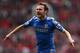 MANCHESTER, ENGLAND - MAY 05: Juan Mata of Chelsea celebrates after scoring the winning goal during the Barclays Premier League match between Manchester United and Chelsea at Old Trafford on May 5, 2013 in Manchester, England. (Photo by Alex Livesey/Get