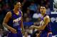 CHARLOTTE, NC - NOVEMBER 22: Teammates Gerald Green #14 and Channing Frye #8 of the Phoenix Suns react after a basket by Green during their game against the Charlotte Bobcats at Time Warner Cable Arena on November 22, 2013 in Charlotte, North Carolina.