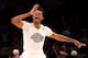 LOS ANGELES, CA - DECEMBER 25: Nick Young #0 of the Los Angeles Lakers celebrates after making a three point basket against the Miami Heat at Staples Center on December 25, 2013 in Los Angeles, California. The Heat won 101-95. NOTE TO USER: User express