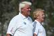 DOHA, QATAR - JANUARY 21: John Daly of the USA (left) and Gordon Strachan, manager of the Scotland football team, in action during the Pro Am prior to the start of the Commercial Bank Qatar Masters at Doha Golf Club on January 21, 2014 in Doha, Qatar. (