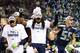 SEATTLE, WA - JANUARY 19: Cornerback Richard Sherman #25 of the Seattle Seahawks celebrates on the field after the Seahawks defeat the San Francisco 49ers 23-17 in the 2014 NFC Championship at CenturyLink Field on January 19, 2014 in Seattle, Washington.
