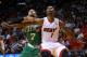 MIAMI, FL - JANUARY 21: Chris Bosh #1 of the Miami Heat boxes out Jared Sullinger #7 of the Boston Celtics during a game at AmericanAirlines Arena on January 21, 2014 in Miami, Florida. NOTE TO USER: User expressly acknowledges and agrees that, by downlo