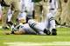 EAST RUTHERFORD, NJ - AUGUST 24: Mark Sanchez #6 of the New York Jets lies on the field after he was injured against the New York Giants during their pre season game at MetLife Stadium on August 24, 2013 in East Rutherford, New Jersey. (Photo by Al Bel