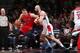 WASHINGTON, DC - JANUARY 3: Jonas Valanciunas #17 of the Toronto Raptors drives against Marcin Gortat #4 of the Washington Wizards during the game at the Verizon Center on January 3, 2014 in Washington, DC. NOTE TO USER: User expressly acknowledges and ag