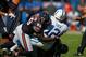 Sep 9, 2012; Chicago, IL, USA; Chicago Bears defensive end Henry Melton (69) sacks Indianapolis Colts quarterback Andrew Luck (12) during the second half at Soldier Field. The Bears won 41-21. Mandatory Credit: Dennis Wierzbicki-USA TODAY Sports