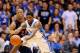 DURHAM, NC - JANUARY 13: Akil Mitchell #25 of the Virginia Cavaliers defends on a pass to Amile Jefferson #21 of the Duke Blue Devils in the high post during their game at Cameron Indoor Stadium on January 13, 2014 in Durham, North Carolina. Duke won 69-