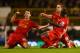LONDON, ENGLAND - DECEMBER 15: Jordan Henderson of Liverpool celebrates scoring their second goal with Jon Flanagan (L) and Mamadou Sakho of Liverpool (R) during the Barclays Premier League match between Tottenham Hotspur and Liverpool at White Hart Lane