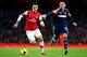 LONDON, ENGLAND - JANUARY 18: Mesut Oezil of Arsenal is chased by Clint Dempsey of Fulham during the Barclays Premier League match between Arsenal and Fulham at Emirates Stadium on January 18, 2014 in London, England. (Photo by Clive Mason/Getty Images)