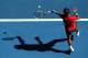 MELBOURNE, AUSTRALIA - JANUARY 22: Rafael Nadal of Spain plays a forehand in his quarterfinal match against Grigor Dimitrov of Bulgaria during day 10 of the 2014 Australian Open at Melbourne Park on January 22, 2014 in Melbourne, Australia. (Photo by Cl