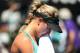 MELBOURNE, AUSTRALIA - JANUARY 23: Eugenie Bouchard of Canada looks on in her semifinal match against Na Li of China during day 11 of the 2014 Australian Open at Melbourne Park on January 23, 2014 in Melbourne, Australia. (Photo by Scott Barbour/Getty I