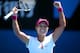 MELBOURNE, AUSTRALIA - JANUARY 23: Na Li of China celebrates winning her semifinal match against Eugenie Bouchard of Canada during day 11 of the 2014 Australian Open at Melbourne Park on January 23, 2014 in Melbourne, Australia. (Photo by Chris Hyde/Get