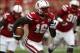 Sep 7, 2013; Lincoln, NE, USA; Nebraska Cornhuskers defender Stanley Jean-Baptiste (16) returns an interception for a touchdown against the Southern Mississippi Golden Eagles in the first quarter at Memorial Stadium. Mandatory Credit: Bruce Thorson-USA TO