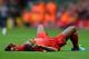 LIVERPOOL, ENGLAND - SEPTEMBER 01: Glen Johnson of Liverpool lies injured during the Barclays Premier League match between Liverpool and Manchester United at Anfield on September 01, 2013 in Liverpool, England. (Photo by Alex Livesey/Getty Images)