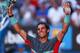 MELBOURNE, AUSTRALIA - JANUARY 22: Rafael Nadal of Spain celebrates winning his quarterfinal match against Grigor Dimitrov of Bulgaria during day 10 of the 2014 Australian Open at Melbourne Park on January 22, 2014 in Melbourne, Australia. (Photo by Ren