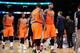 NEW YORK, NY - NOVEMBER 10: Carmelo Anthony #7 of the New York Knicks walks into the locker room during half time against the San Antonio Spurs with his teammates Raymond Felton #2, J.R. Smith #8 and Amar'e Stoudemire #1 at Madison Square Garden on Novem
