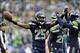 Dec 22, 2013; Seattle, WA, USA; Seattle Seahawks cornerback Richard Sherman (25) celebrates during the first half after intercepting a pass thrown by Arizona Cardinals quarterback Carson Palmer (3) (not pictured) at CenturyLink Field. Mandatory Credit: St