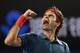 MELBOURNE, AUSTRALIA - JANUARY 22: Roger Federer of Switzerland celebrates winning his quarterfinal match against Andy Murray of Great Britain during day 10 of the 2014 Australian Open at Melbourne Park on January 22, 2014 in Melbourne, Australia. (Phot