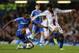LONDON, ENGLAND - SEPTEMBER 18: John Obi Mikel of Chelsea and Mohamed Salah of FC Basel battle for the ball during the UEFA Champions League Group E Match between Chelsea and FC Basel at Stamford Bridge on September 18, 2013 in London, England. (Photo b