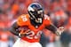 DENVER, CO - JANUARY 19: Montee Ball #28 of the Denver Broncos runs with the ball against the New England Patriots during the AFC Championship game at Sports Authority Field at Mile High on January 19, 2014 in Denver, Colorado. (Photo by Elsa/Getty Imag