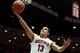 TUCSON, AZ - JANUARY 23: Nick Johnson #13 of the Arizona Wildcats lays up a shot against the Colorado Buffaloes during the first half of the college basketball game at McKale Center on January 23, 2014 in Tucson, Arizona. (Photo by Christian Petersen/Ge