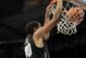 SPOKANE, WA - JANUARY 08: Josh Scott #40 of the Colorado Buffaloes dunks against the Washington State Cougars during the game at Spokane Arena on January 8, 2014 in Spokane, Washington. (Photo by William Mancebo/Getty Images)