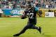 JACKSONVILLE, FL - DECEMBER 05: Maurice Jones-Drew #32 of the Jacksonville Jaguars rushes for yardage during the game against the Houston Texans at EverBank Field on December 5, 2013 in Jacksonville, Florida. (Photo by Sam Greenwood/Getty Images)