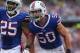 ORCHARD PARK, NY - OCTOBER 13: Kiko Alonso #50 of the Buffalo Bills and Da'Norris Searcy #25 celebrate after stopping the Cincinnati Bengals during NFL game action at Ralph Wilson Stadium on October 13, 2013 in Orchard Park, New York. (Photo by Tom Szcze