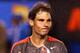 MELBOURNE, AUSTRALIA - JANUARY 24: Rafael Nadal of Spain celebrates winning his semifinal match against Roger Federer of Switzerland during day 12 of the 2014 Australian Open at Melbourne Park on January 24, 2014 in Melbourne, Australia. (Photo by Matt