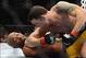 Dec 28, 2013; Las Vegas, NV, USA; Chris Weidman (red gloves) and Anderson Silva (blue gloves) fight during their UFC middleweight championship bout at the MGM Grand Garden Arena. Weidman won. Mandatory Credit: Jayne Kamin-Oncea-USA TODAY Sports