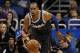 Jan 17, 2014; Orlando, FL, USA; Orlando Magic shooting guard Arron Afflalo (4) drives to the basket against the Charlotte Bobcats during the second half at Amway Center. Charlotte Bobcats defeated the Orlando Magic 111-101. Mandatory Credit: Kim Klement-U