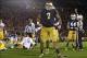 Oct 19, 2013; South Bend, IN, USA; Notre Dame Fighting Irish defensive end Stephon Tuitt (7) celebrates after sacking USC Trojans quarterback Cody Kessler (6) in the third quarter at Notre Dame Stadium. Notre Dame won 14-10. Mandatory Credit: Matt Cashore
