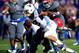 LAWRENCE, KS - NOVEMBER 16: Running back Charles Sims #3 of the West Virginia Mountaineers carries the ball during the game against the Kansas Jayhawks at Memorial Stadium on November 16, 2013 in Lawrence, Kansas. (Photo by Jamie Squire/Getty Images)