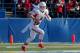 SAN JOSE, CA - NOVEMBER 29: Quarterback Derek Carr #4 of the Fresno State Bulldogs picks up 12 yards and a first down as he holds on to the ball against the San Jose State Spartans in the first quarter on November 29, 2013 at Spartan Stadium in San Jose,