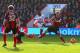 BOURNEMOUTH, ENGLAND - JANUARY 25: Matt Ritchie of Bournemouth fails to block Victor Moses of Liverpool as he scores the opening goal during the FA Cup Fourth Round match between Bournemouth and Liverpool at Goldsands Stadium on January 25, 2014 in Bourne