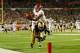 MIAMI GARDENS, FL - JANUARY 07: Ha'Sean Clinton-Dix #6 of the Alabama Crimson Tide intercepts a pass intended for DaVaris Daniels #10 of the Notre Dame Fighting Irish in the third quarter of the 2013 Discover BCS National Championship game at Sun Life St