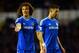 DERBY, ENGLAND - JANUARY 05: David Luiz of Chelsea and Gary Cahill of Chelsea in action during the Budweiser FA Cup Third Round match between Derby County and Chelsea at iPro Stadium on January 5, 2014 in Derby, England. (Photo by Michael Regan/Getty Im