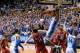 DURHAM, NC - JANUARY 18: Jabari Parker #1 of the Duke Blue Devils dunks over Jordan Vandenberg #14 of the North Carolina State Wolfpack during their game at Cameron Indoor Stadium on January 18, 2014 in Durham, North Carolina. Duke won 95-60. (Photo by